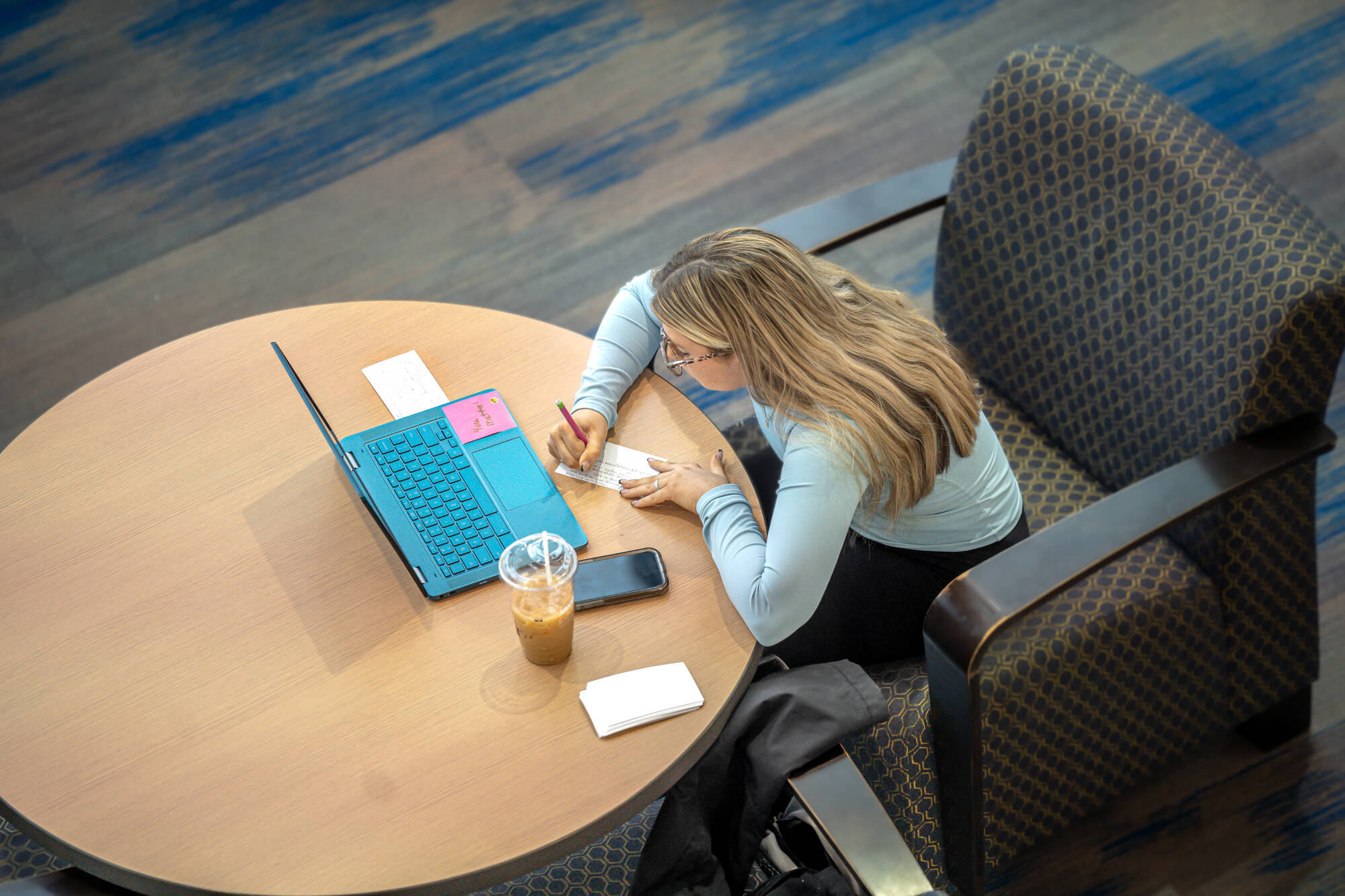 A student is diligently preparing for final exams, utilizing the Mary Idema Pew Library's resources and collaborative spaces